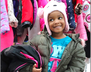 a cleaner world give a kid a coat